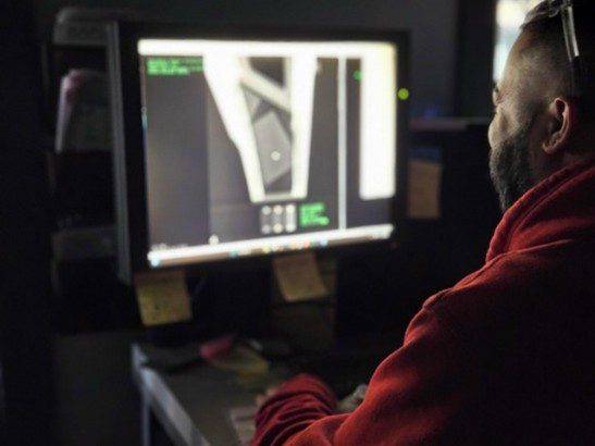 a man reviewing an x-ray image